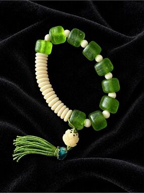 Green and Ivory Stretch Bracelet with Tassel